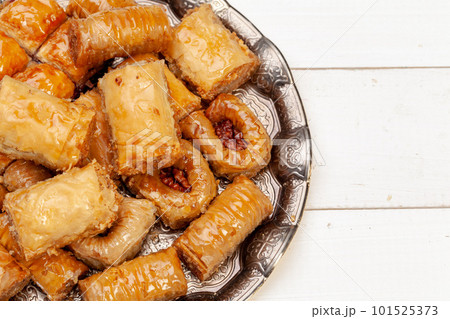 Close up photo of Delicious Turkish Baklava served on a plate Close up photo of Delicious Turkish Baklava served on a plate 101525373