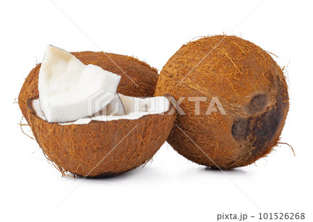 close up of a coconut craked into pieces close up of a coconut craked into pieces 101526268