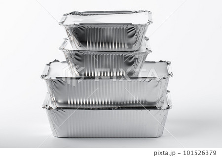 Takeaway meal in foil food box on white background 101526379