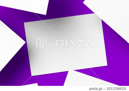 Blank white businesscards on purple background, copy space 101526620