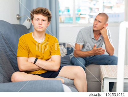 Father apologizes to teenager son after quarrel at home Father apologizes to teenager son after quarrel at home 101531051