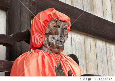 Wooden statue of Binzuru Pindola Bharadvaja, a disciple of Buddha located near the giant Buddha statue at Todaiji Temple in Nara Japan 101533857