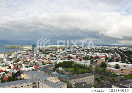 Aerial view of colorful buildings and lush greenery of Reykjavik, Iceland 101534089