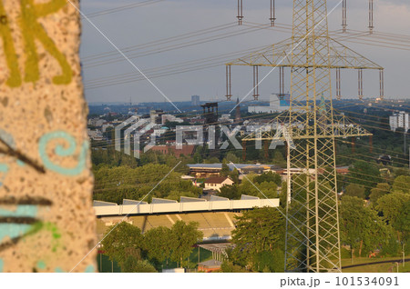 High voltage pylons and graffiti on concrete in Ruhr area, NRW, Germany 101534091