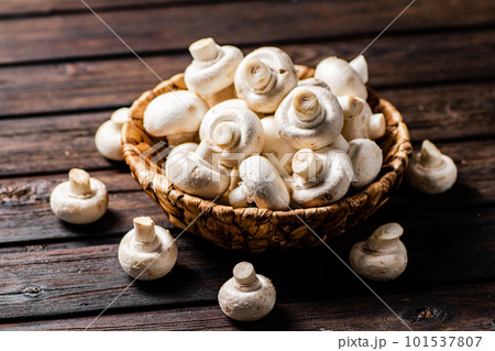 Fresh mushrooms in a basket. 101537807