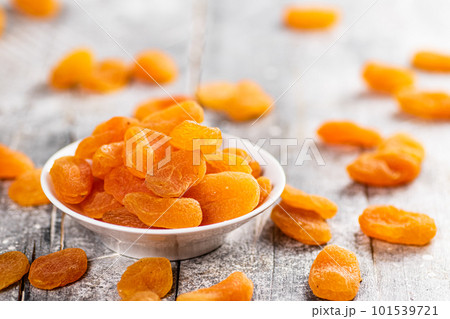 Fragrant dried apricots in a bowl on the table. Fragrant dried apricots in a bowl on the table. 101539721