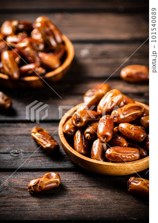 Fresh dates in two plates. Fresh dates in two plates. 101540089
