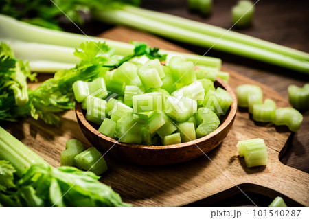Sliced fresh celery on a cutting board. Sliced fresh celery on a cutting board. 101540287