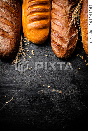 Different types of fresh bread on the table. 101541564