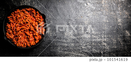 Delicious bolognese sauce in a frying pan. Delicious bolognese sauce in a frying pan. 101541619