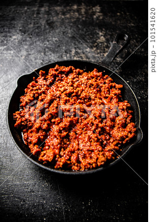 Delicious bolognese sauce in a frying pan. Delicious bolognese sauce in a frying pan. 101541620