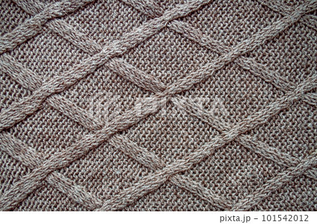 Handmade knitted background with macro weave threads. Handmade knitted background with macro weave threads. 101542012