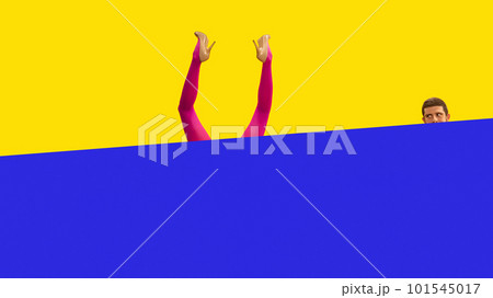 Curious, interested, young man looking out blue background and peeping at female legs in red tights and heels sticking out vivid yellow background 101545017