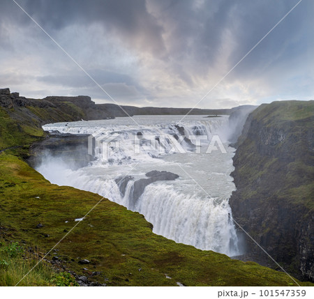 Picturesque full of water big waterfall Gullfoss autumn view, southwest Iceland. Picturesque full of water big waterfall Gullfoss autumn view, southwest Iceland. 101547359