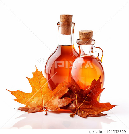 Appetizing maple syrup in bottle and maple leaf, isolated on white, healthy sweetness, healthy lifestyle food concept 101552269