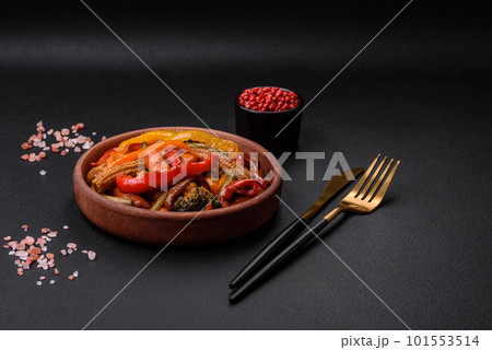 Mix of vegetables corn, carrots, peppers, broccoli, onions in teriyaki sauce 101553514