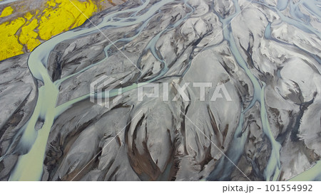 Glacial Rivers from Above, Aerial View of the River Streams from Icelandic Glaciers. Beautiful Art of the Mother Nature Created in Iceland. Wallpaper Background Glacial Rivers from Above, Aerial View of the River Streams from Icelandic Glaciers. Beautiful Art of the Mother Nature Created in Iceland. Wallpaper Background 101554992