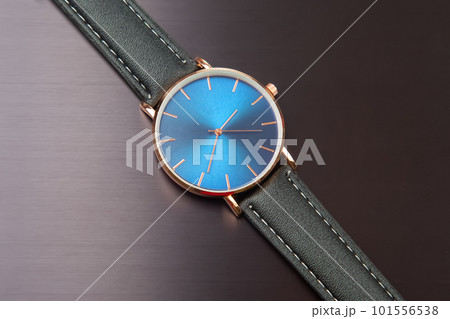 Wrist mechanical watch on a dark background Wrist mechanical watch on a dark background 101556538
