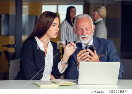 Mature businessman leader mentor talking to diverse colleagues team listening to caucasian ceo. Mature businessman leader mentor talking to diverse colleagues team listening to caucasian ceo. 101556874
