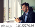 Young businessman talking on the phone at the office 101557086