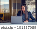 Portrait of beautiful businesswoman working with laptop at office. Business concept. Portrait of modern successful female leader 101557089