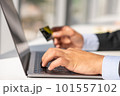 Woman working at home office hand on keyboard close up 101557102