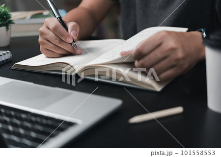 learning online class by using laptop computer and writing notebook at workplace, Education development or knowledge improvement concept. 101558553