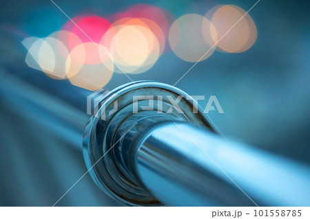handrail railing made of stainless material close-up near the river embankment. handrail railing made of stainless material close-up near the river embankment. 101558785
