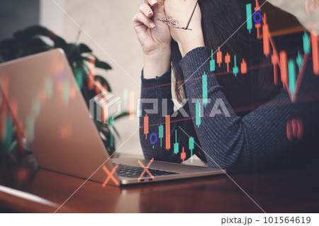 Businesswoman working with laptop on wooden desk, stock market chart. Businesswoman working with laptop on wooden desk, stock market chart. 101564619
