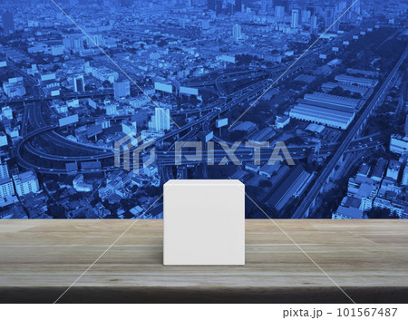 White block cubes on wooden table White block cubes on wooden table 101567487