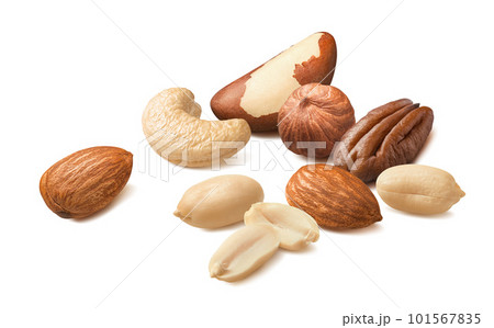 Scattered pecan, hazelnut, almond, peanut and brazil nuts isolated on white background. 101567835
