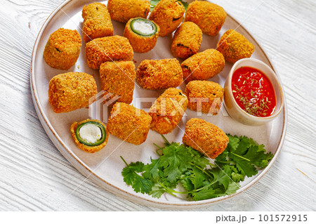 breaded crispy fried jalapeno poppers, top view 101572915