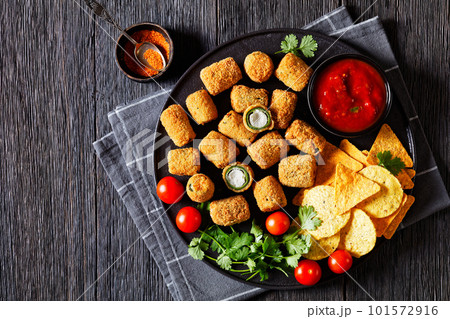 breaded crispy fried jalapeno poppers, top view 101572916