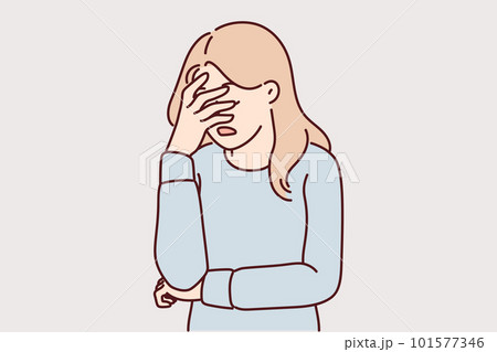 Upset girl covers face with hand due to stress and lack of strength to solve problem Upset girl covers face with hand due to stress and lack of strength to solve problem 101577346