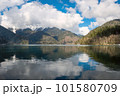 Aerial shot of beautiful alpine lake Ritsa speed boat floating summer, View from Above on Gorgeous Lake Ritsa 101580709