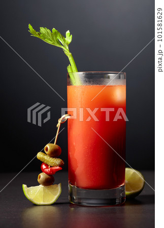 Cocktail Bloody Mary on a black background. Cocktail Bloody Mary on a black background. 101581629