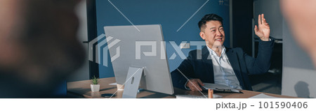 Busy multiethnic coworkers cooperating and working together at office meeting, teamwork concept Busy multiethnic coworkers cooperating and working together at office meeting, teamwork concept 101590406