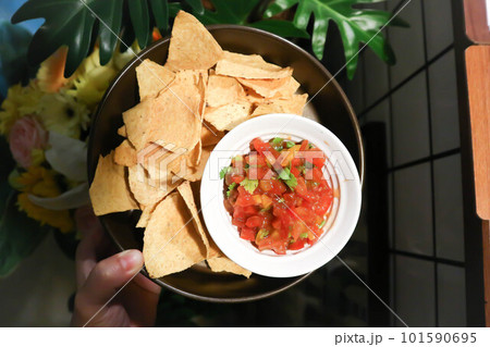 nachos, Nachos Cheese or Mexican snacks with tomato salad nachos, Nachos Cheese or Mexican snacks with tomato salad 101590695