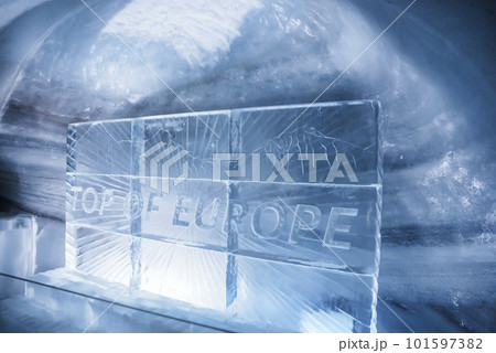 Interior of ice palace with top of europe text on frame in glacier tunnel at Jungfrau, Switzerland, winter holiday travel concept Interior of ice palace with top of europe text on frame in glacier tunnel at Jungfrau, Switzerland, winter holiday travel concept 101597382