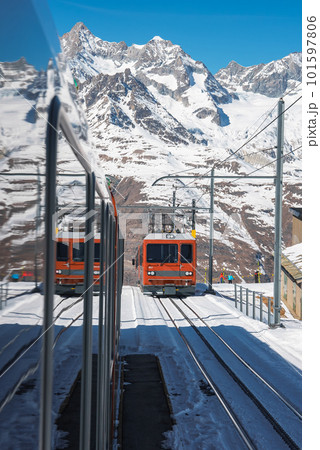 The train of Gonergratbahn running to the Gornergrat station and Stellarium Observatory - famous touristic place with clear view to Matterhorn. Glacier Express train. 101597806