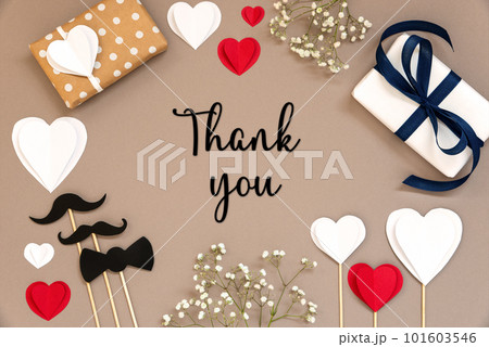 Flat Lay With Accessories, Gifts, Hearts, Text Thank You Flat Lay With Accessories, Gifts, Hearts, Text Thank You 101603546
