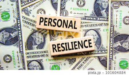 Personal resilience symbol. Concept word Personal resilience typed on wooden blocks. Beautiful background from dollar bills. Business psychological and personal resilience concept. Copy space. Personal resilience symbol. Concept word Personal resilience typed on wooden blocks. Beautiful background from dollar bills. Business psychological and personal resilience concept. Copy space. 101604884