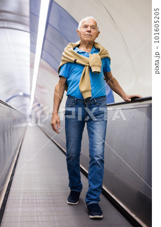 European old man going down to subway 101605205