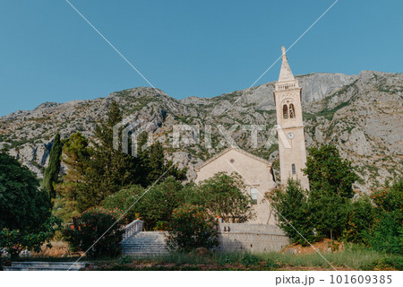 Beautiful view of the coast of Kotor Bay and St.Eustace's Church in the village Dobrota in Montenegro. Church of St. Eustachius is located in Dobrota , Kotor Montenegro. 101609385