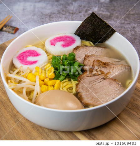 Fresh ramen noodles with garnish, pork tenderloin, eggs marinated in Mirin and soy sauce, bean 101609483