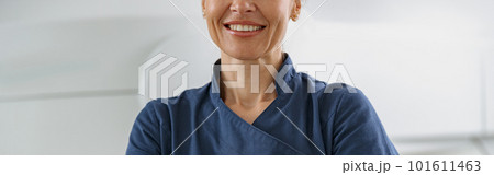 Close up of doctor radiologist on background of MRI or CT Scan with patient undergoing procedure 101611463