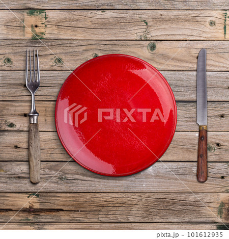 Empty red plate Empty red plate 101612935