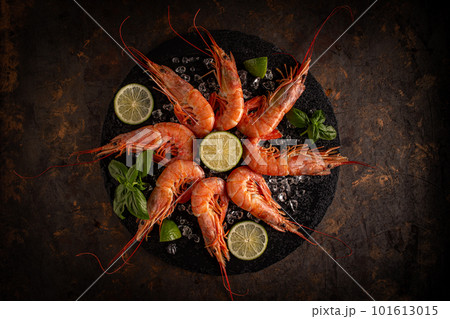 Flat lay of raw king shrimps Flat lay of raw king shrimps 101613015