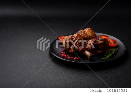 Delicious grilled chicken legs with spices and herbs in teriyaki sauce 101613581