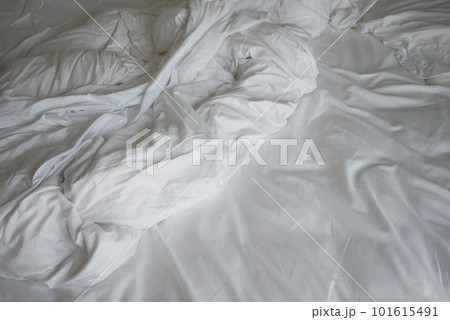 messy bed in early morning , messy bed after waking up  101615491